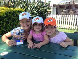 Lili, Sophia and Georja Francis sporting their Hawkes Racing caps at the 2013 Magic Millions QTIS sale...